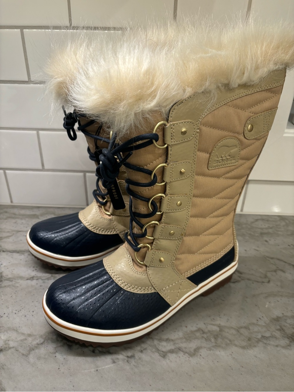 Sorel Women’s Torino Winter Lace-Up Boots in Beige and Black with Faux Fur Trim